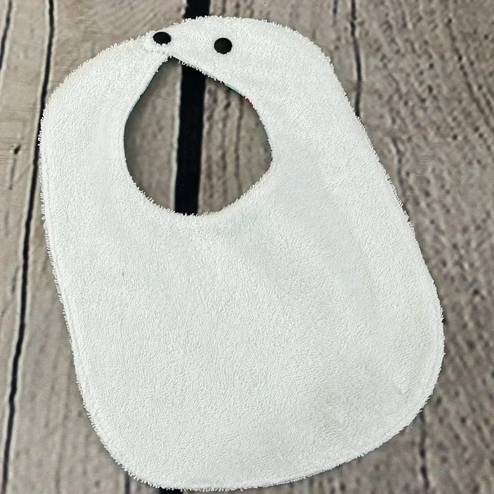 Designer handcrafted transportation bib
